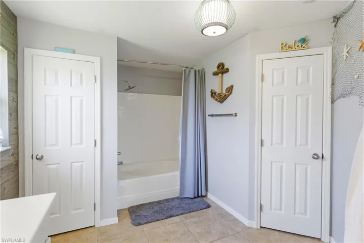 Morning routines made simple: two vanities, a shower, and a closet ready to organize your day.