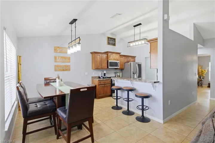 Dining area seamlessly connected to the kitchen and living spaces, perfect for everyday meals or entertaining.