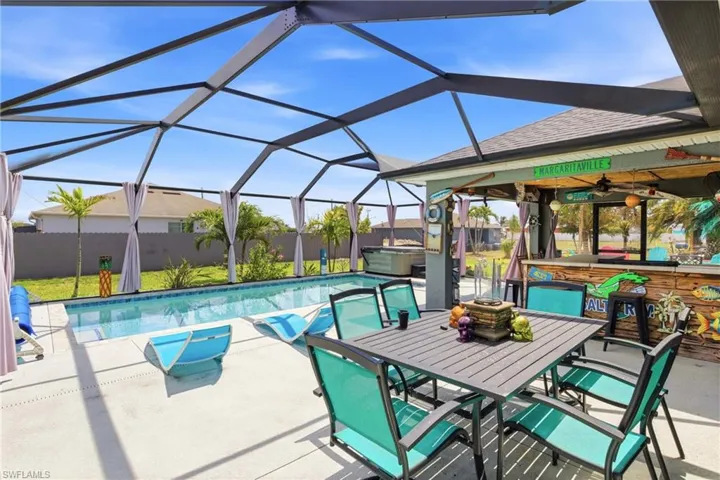 Soak up the sun or unwind in the spa—this pool area is your own personal resort.