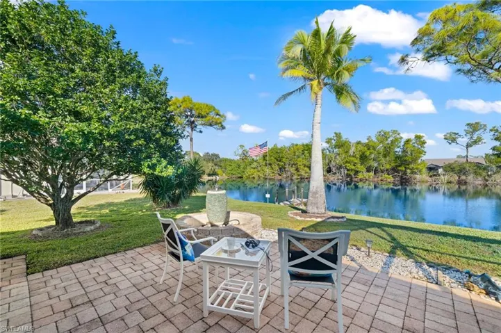 View of patio / terrace featuring a water view