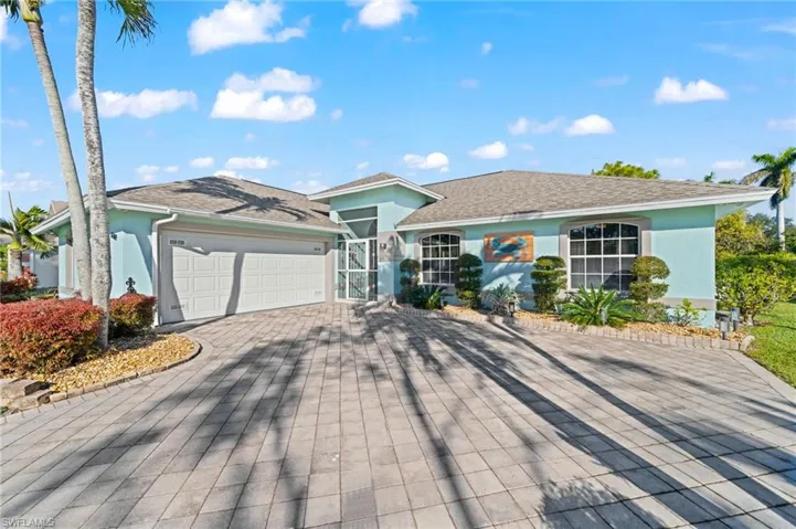 Ranch-style house with a garage