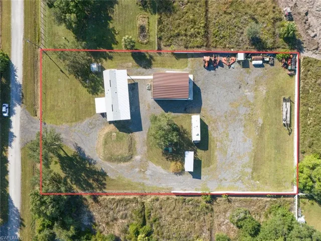 Aerial overview of property's location featuring property boundaries highlighted