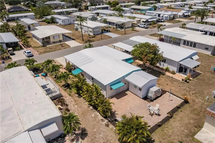 Birds eye view of property with a residential view