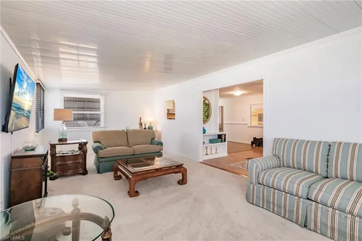 Living room featuring carpet floors