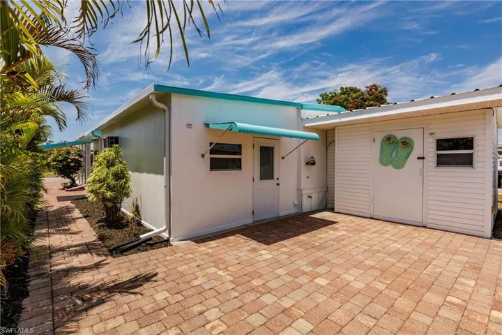 Rear view of property with a patio area