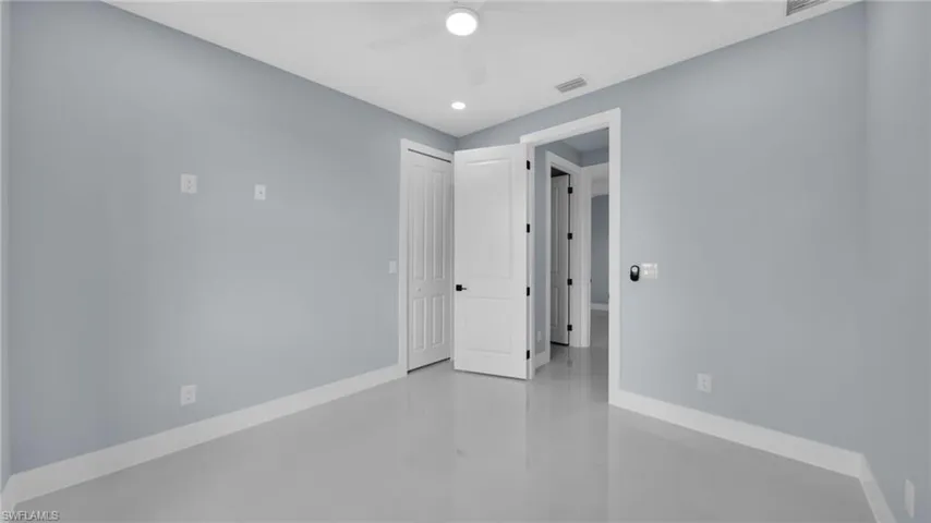 Spare room featuring a ceiling fan and recessed lighting
