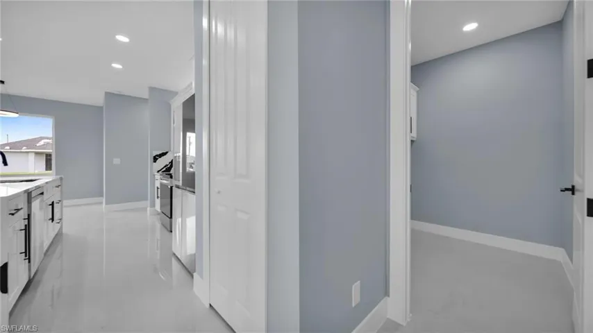 Hallway featuring recessed lighting