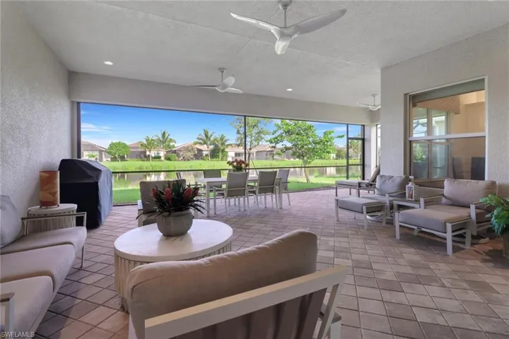 Lanai featuring 3 ceiling fans