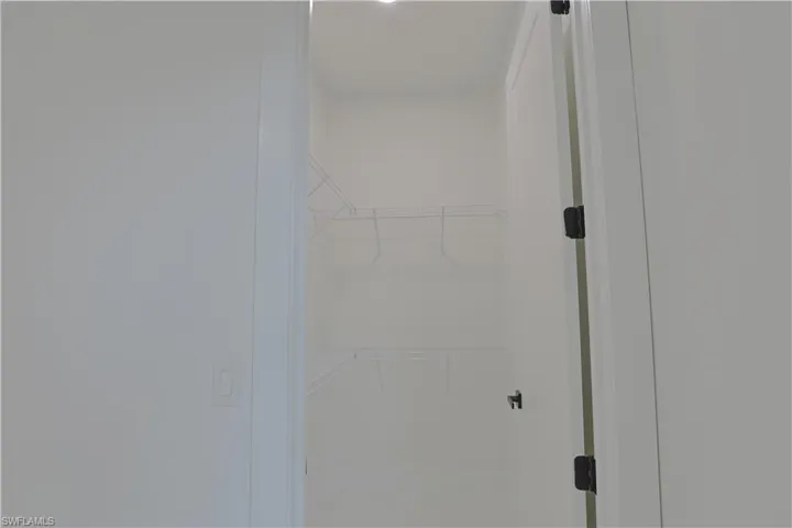 Bathroom featuring a walk in closet