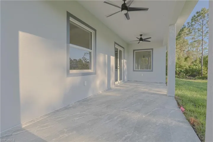 View of patio with a ceiling fan