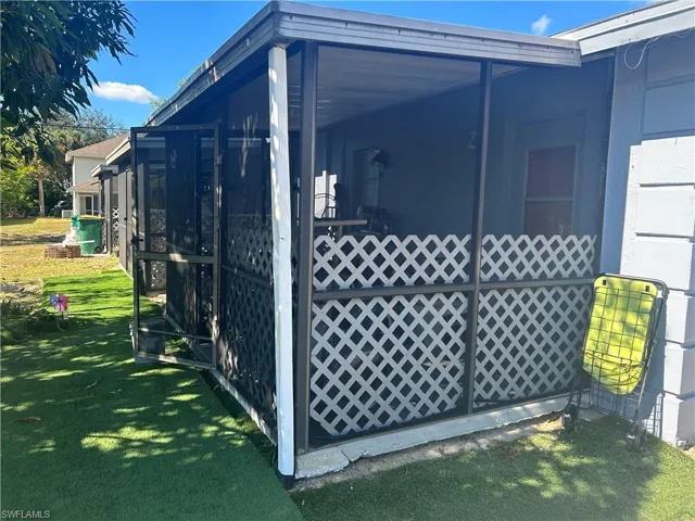 View of home's exterior featuring a lawn