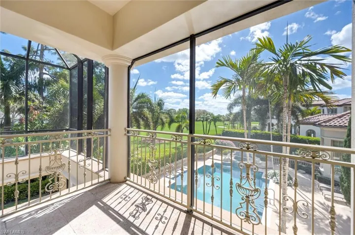 Balcony featuring view of pool