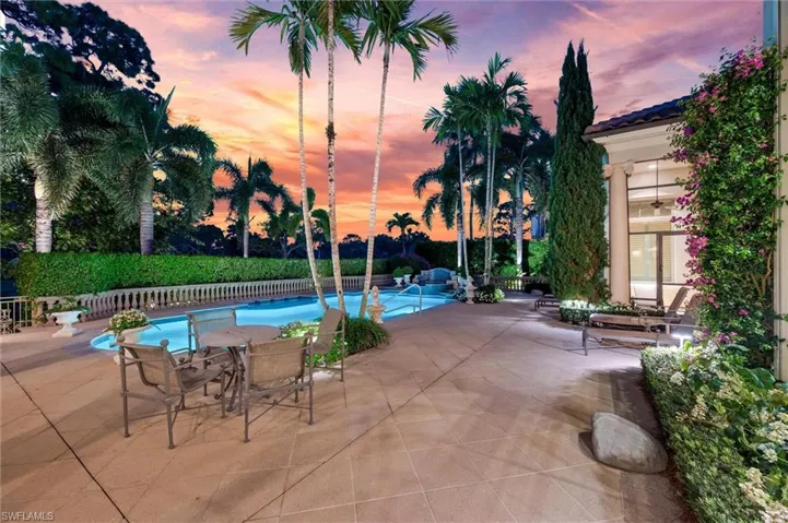 View of swimming pool with patio surround