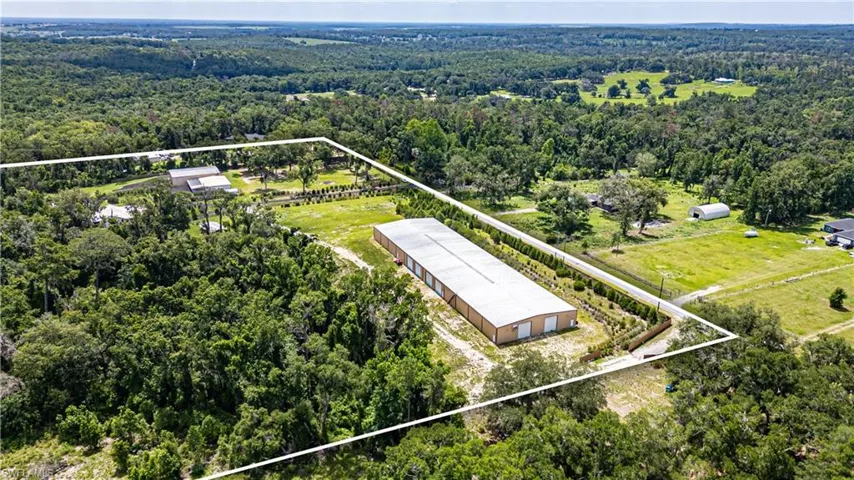 Natural Florida landscape surrounding the property with abundant space and long-term development potential.