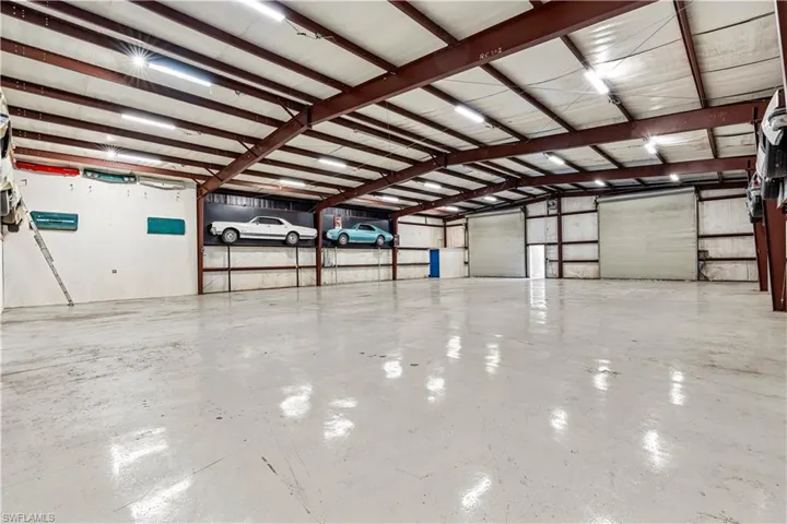 Oversized detached garage offering substantial capacity for vehicles, equipment, or workshop operations—ideal for collectors or contractors.