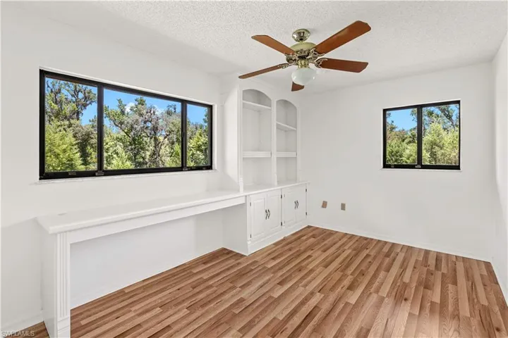 Additional bedrooms provide flexibility for guests or office space, depending on use.