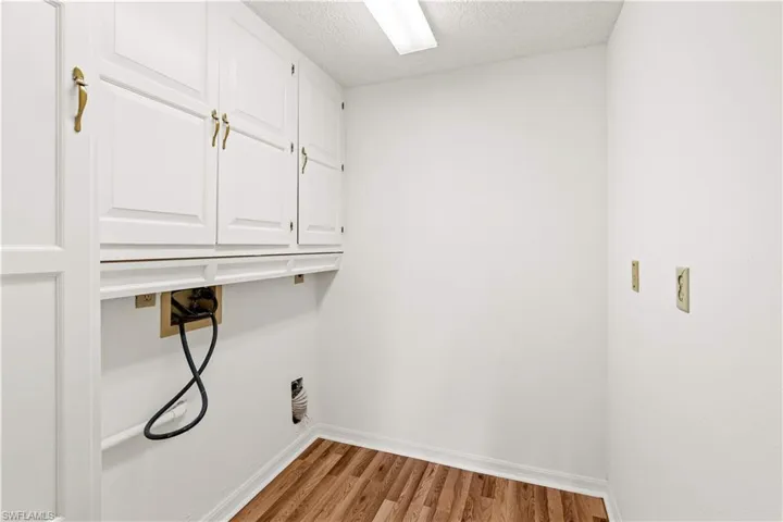 Well-placed utility room offering ease of access and a functional setup for daily living needs.