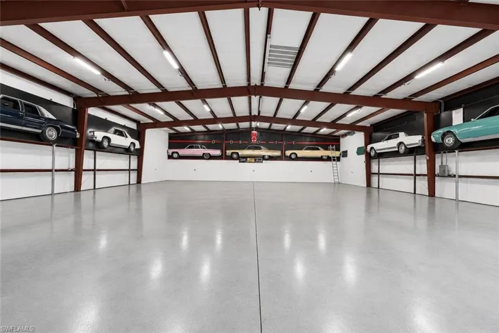 Garage building offering separation of use and expanded storage capability.