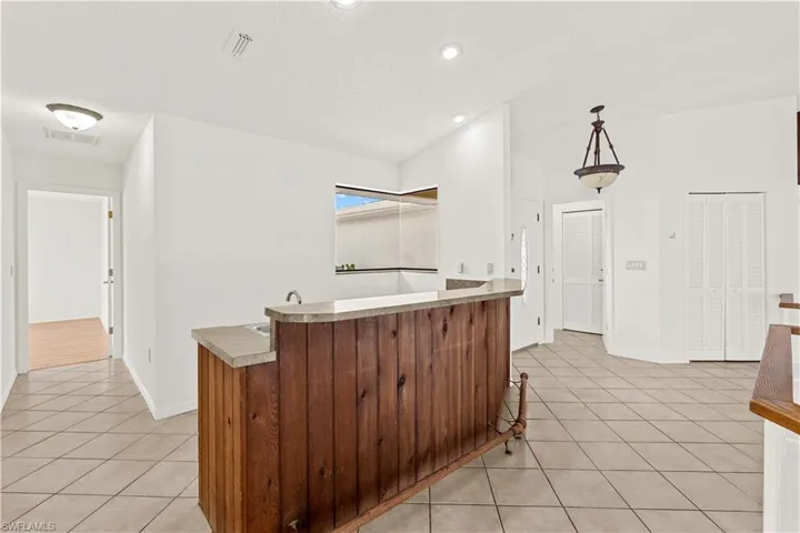 Dedicated bar area designed for entertaining, offering a stylish space for gatherings and casual hosting.