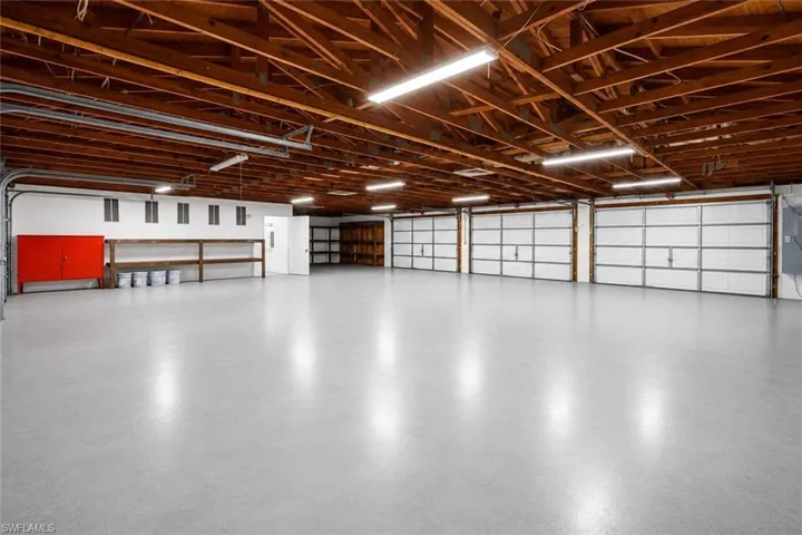 Large-scale garage structure designed for heavy storage, hobby use, or potential business-related applications.