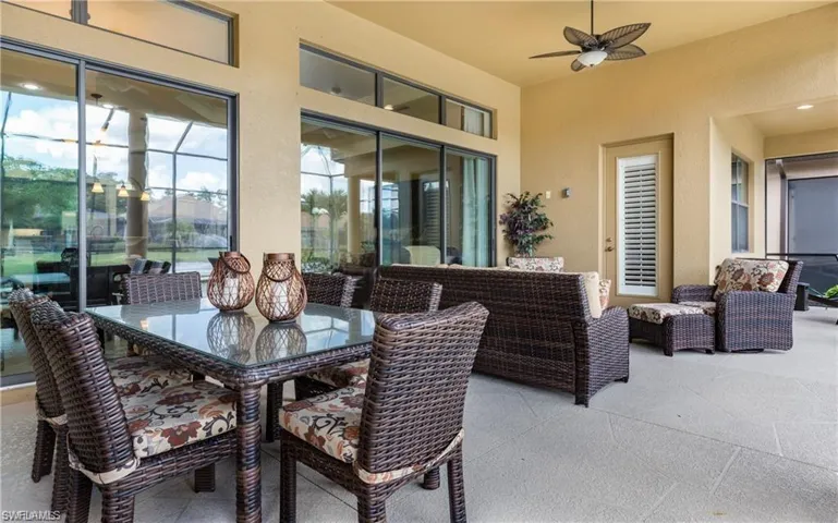 View of patio / terrace featuring a ceiling fan and outdoor dining area