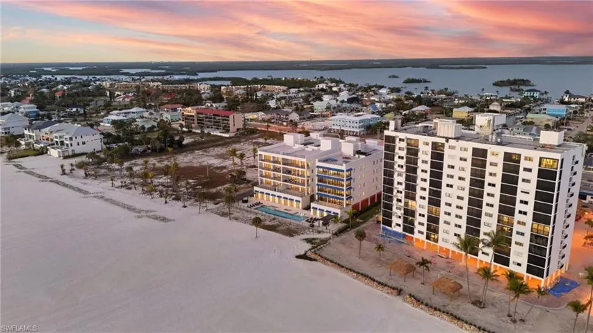 Aerial view at dusk of a water view and a city view