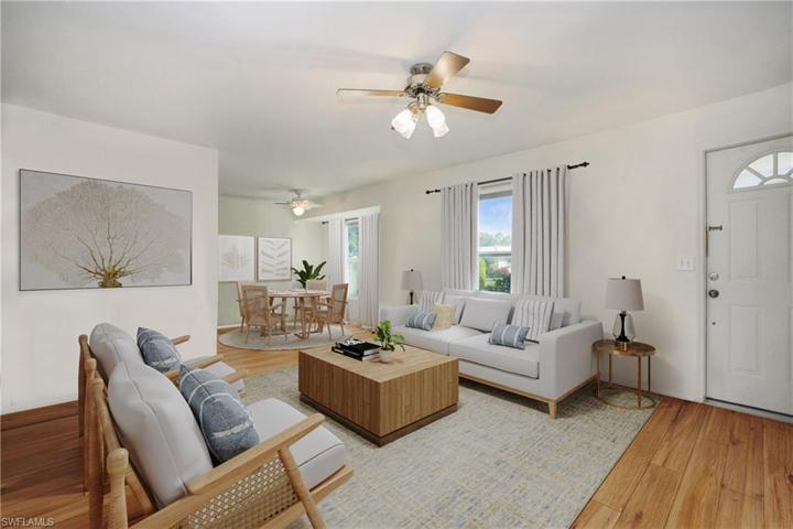 Photo includes reality renovation/staging to showcase the possibility of the living room. Design services included with purchase!