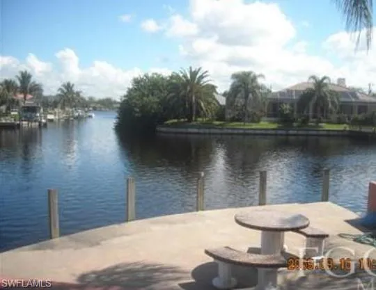 View of dock with a wide intersection water view