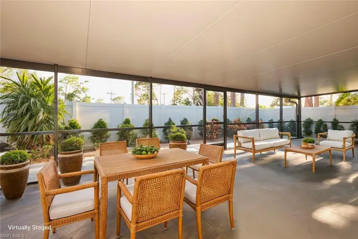 Sunroom featuring a wealth of natural light