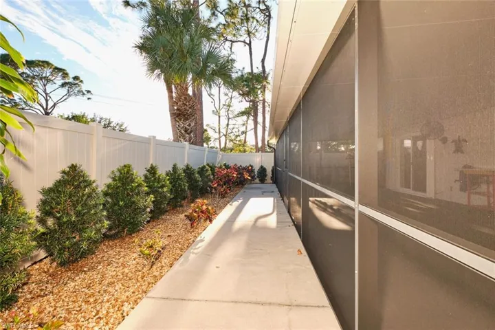 View of side of home with a patio area