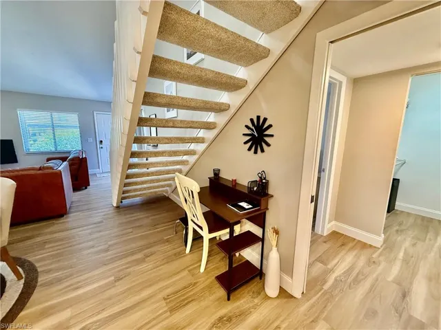 Desk space under stairs.