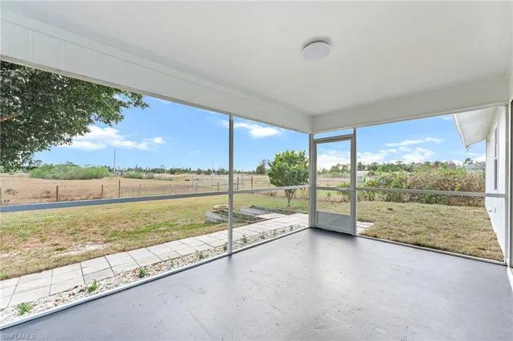 Unfurnished sunroom featuring a view of rural / pastoral area
