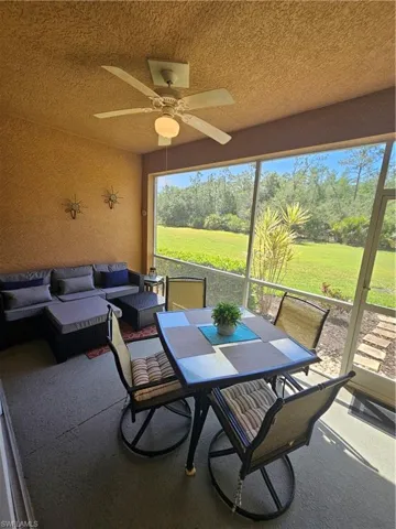 View of patio / terrace featuring ceiling fan and an outdoor hangout area