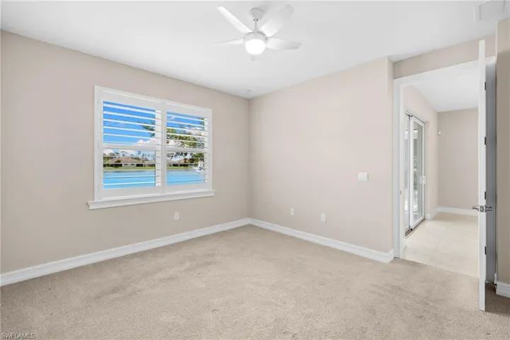 Primary Bedroom with lake views