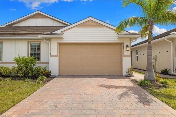 Large driveway with 2 car garage