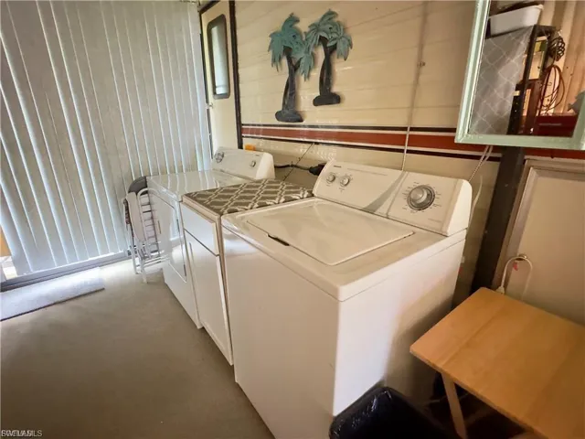 Laundry area featuring washing machine and dryer