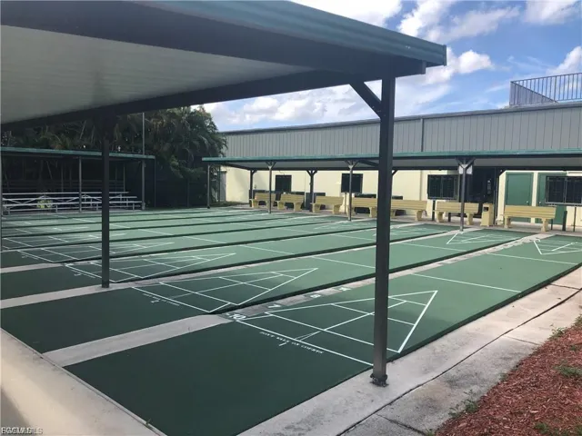View of community featuring shuffleboard