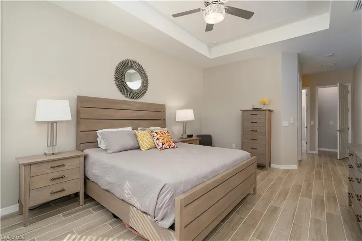 Tray celing adorn the ceilings, gorgeous wood look plank tile throughtout.