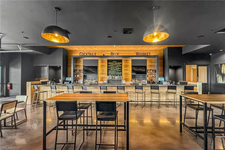 Dining space featuring concrete flooring