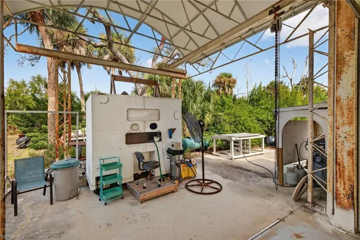 View of patio with view of wooded area