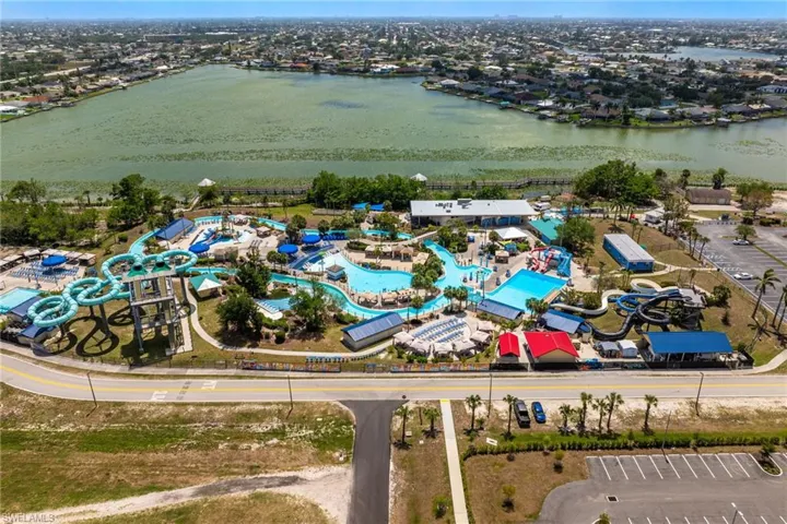 Birds eye view of property with a water park