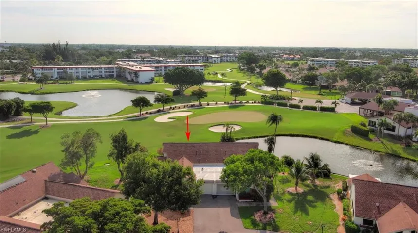 Aerial view of a nearby body of water and a golf club