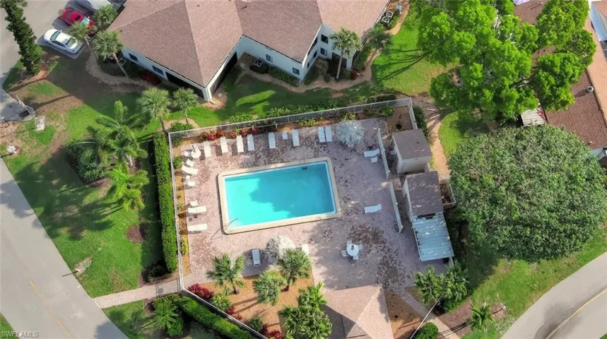 View of subject property with a pool area and property boundaries highlighted