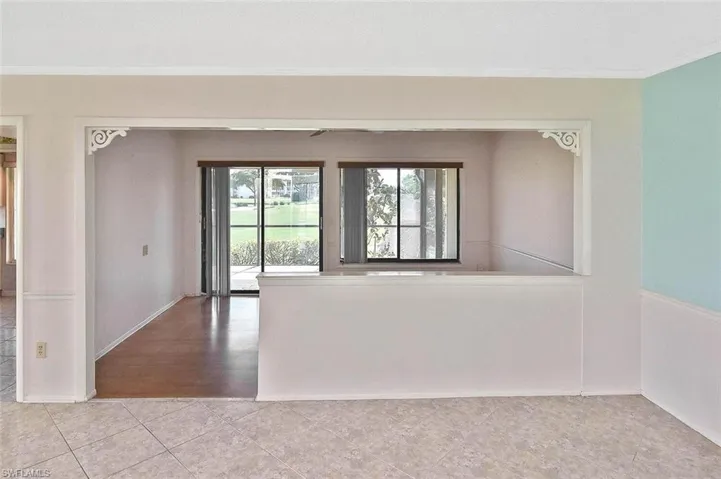 Spare room featuring ornamental molding