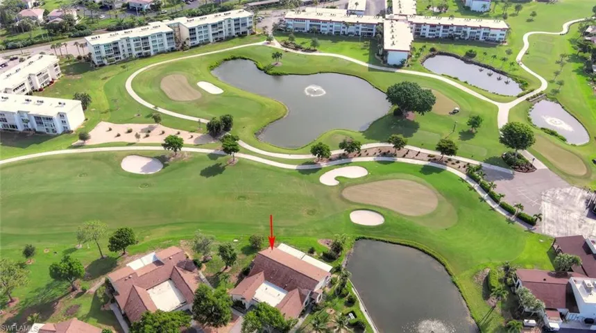 Aerial overview of property's location with a nearby body of water