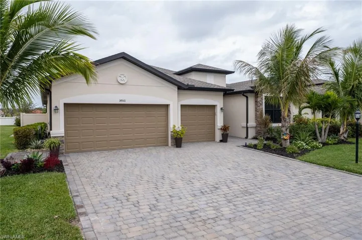 View of front of property with a 3-car garage