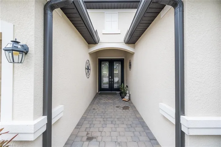 View of exterior front entry with French doors