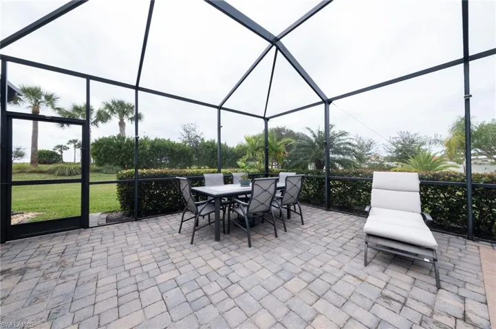 View of outdoor dining/sunbathing area
