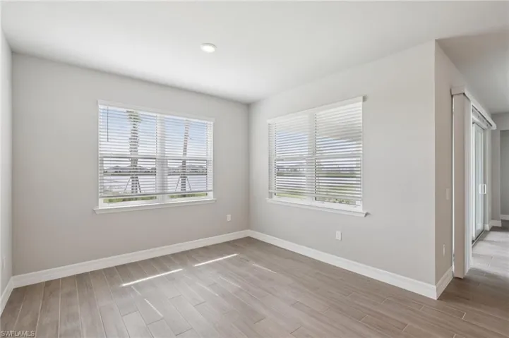 Unfurnished room featuring light wood finished floors