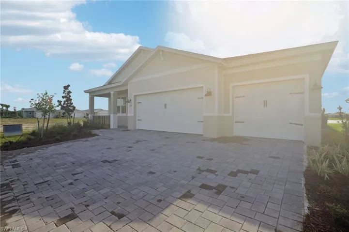 Garage with decorative driveway